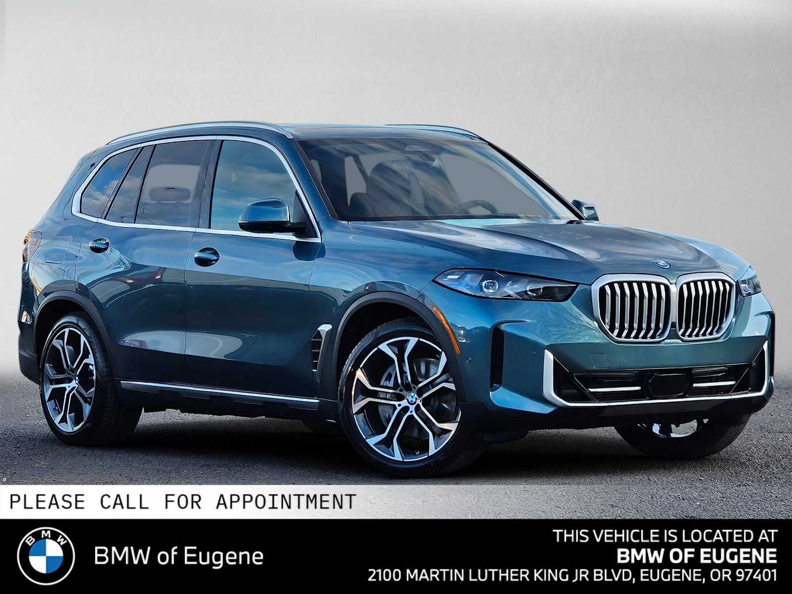 2026 BMW X5 xDrive50e xDrive50e in Blue Ridge Mountain Metallic — front three-quarter view