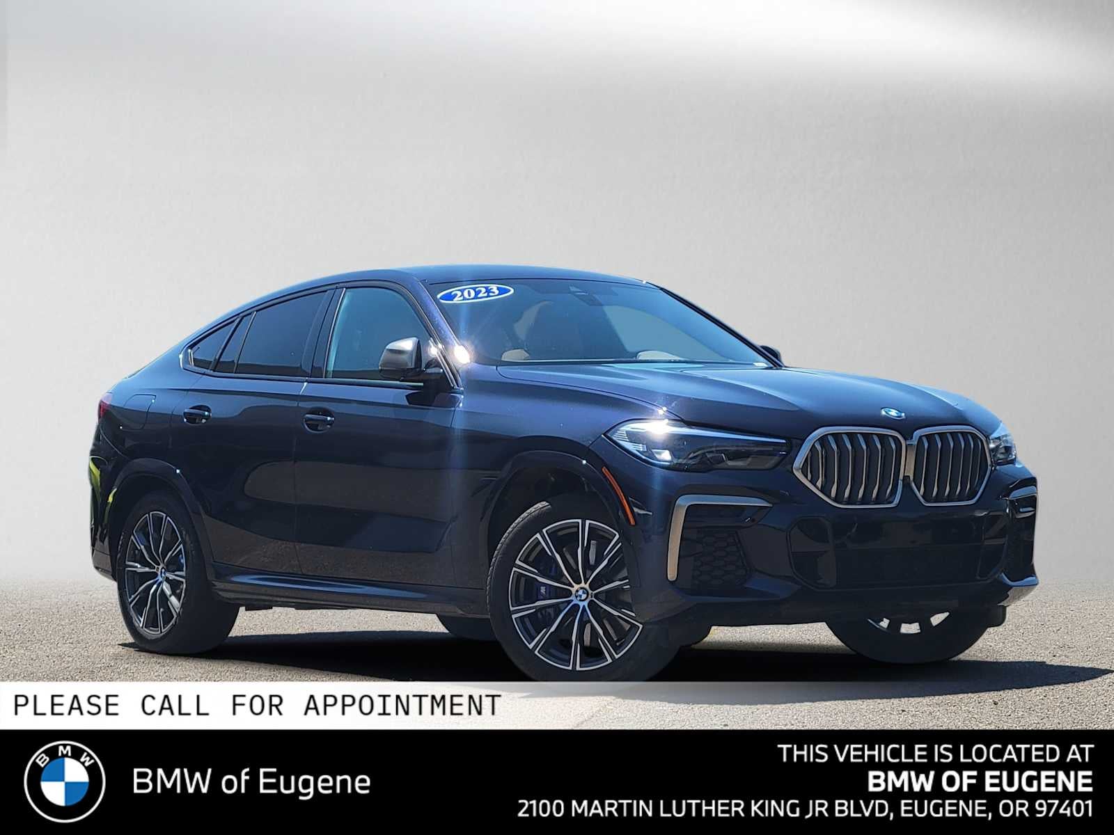 2023 BMW X6 M50i M50i in Carbon Black Metallic — front three-quarter view