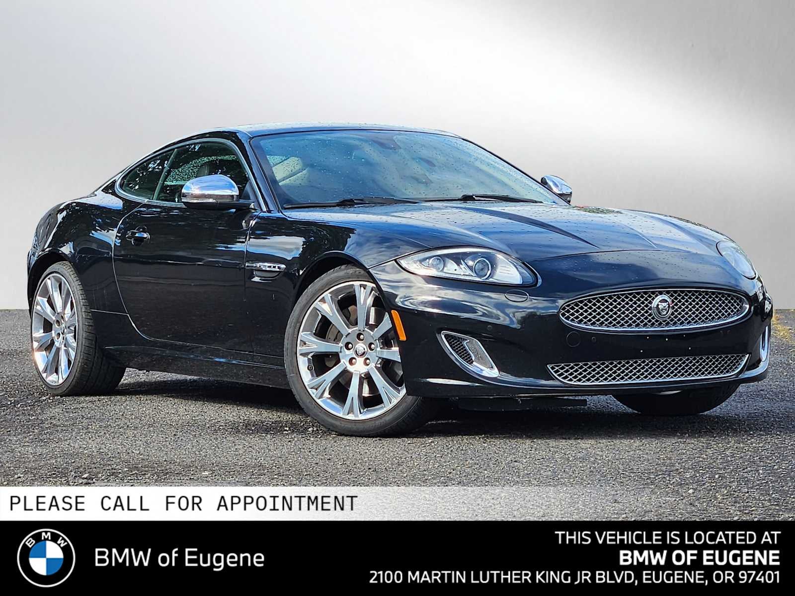 2013 Jaguar XK 2dr Cpe in Celestial Black — front three-quarter view