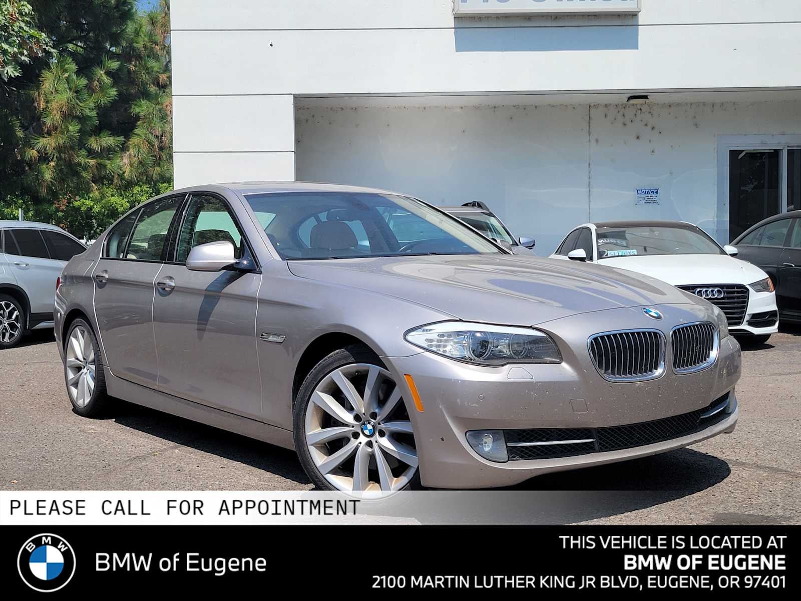 2011 BMW 5 Series 535i in Cashmere Silver Metallic — front three-quarter view