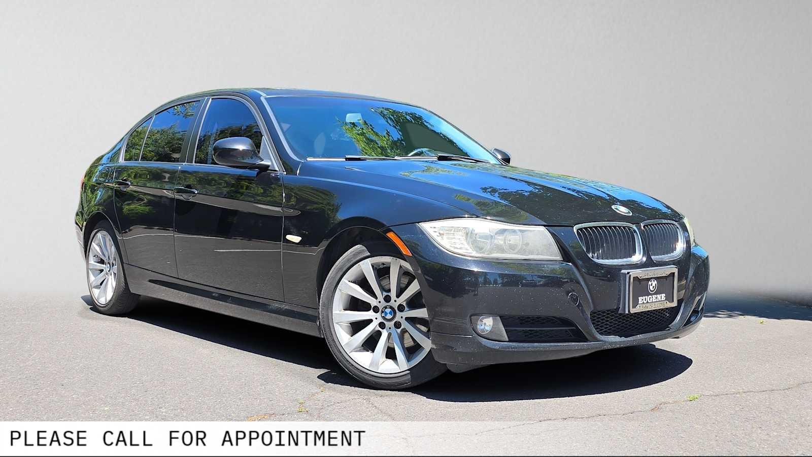 2011 BMW 3 Series 328i in Black — front three-quarter view