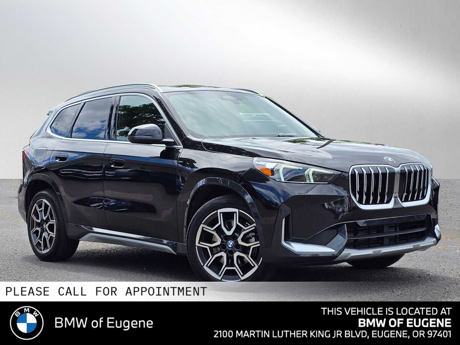 2025 BMW X1 xDrive28i xDrive28i in Black Sapphire Metallic — front three-quarter view