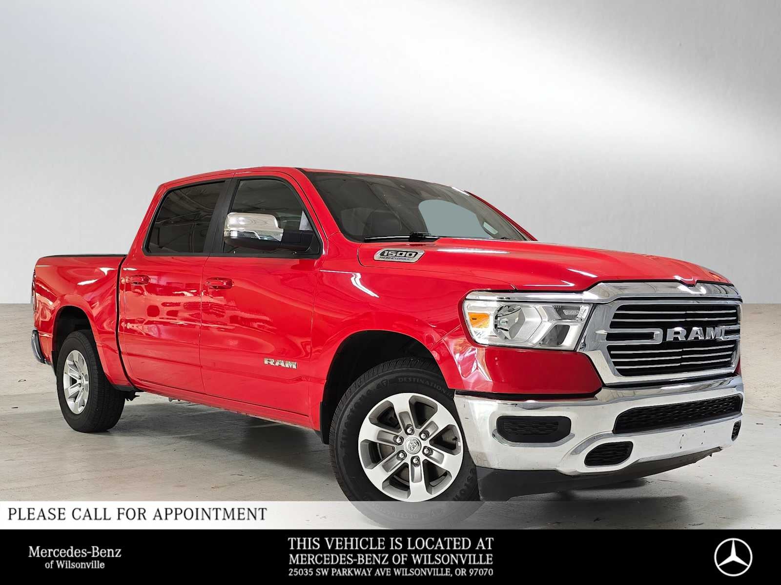 2023 RAM 1500 Laramie in Flame Red Clearcoat — front three-quarter view