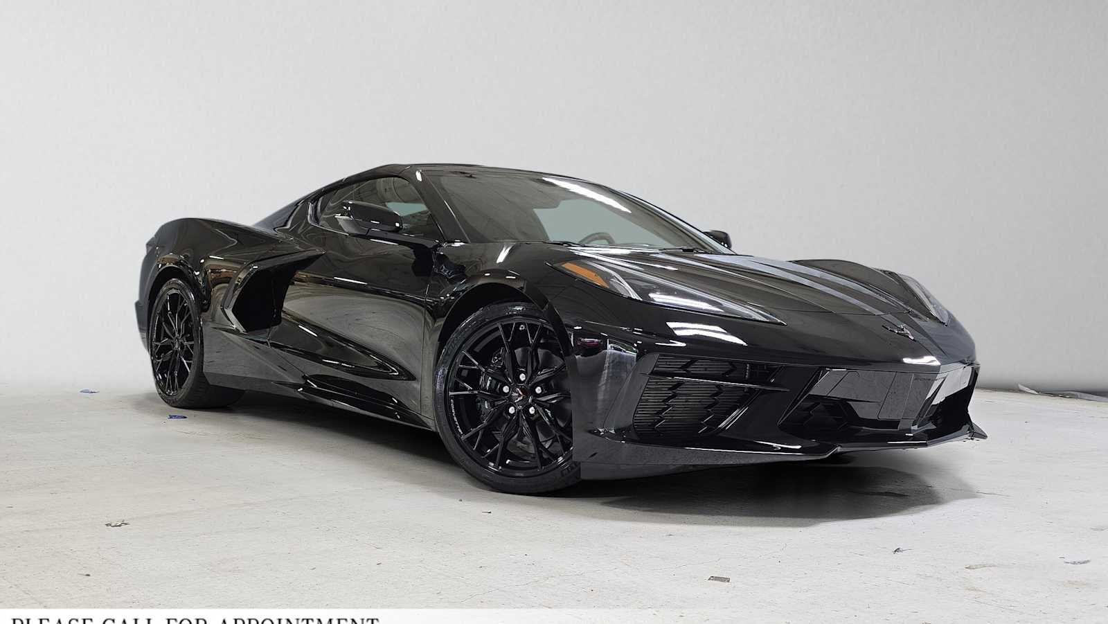 2026 Chevrolet Corvette 1LT in Black — front three-quarter view