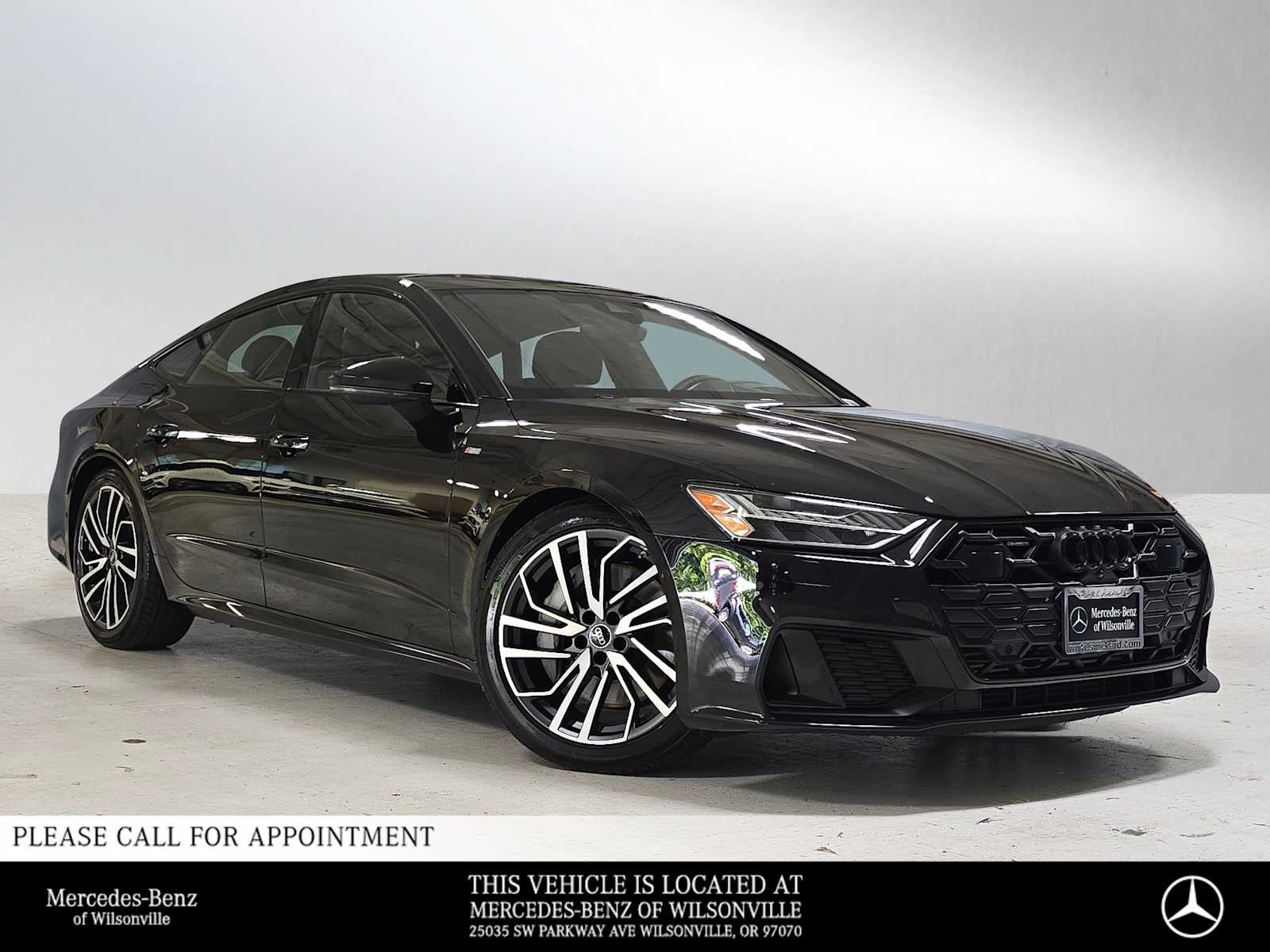 2025 Audi A7 Prestige in Brilliant Black — front three-quarter view