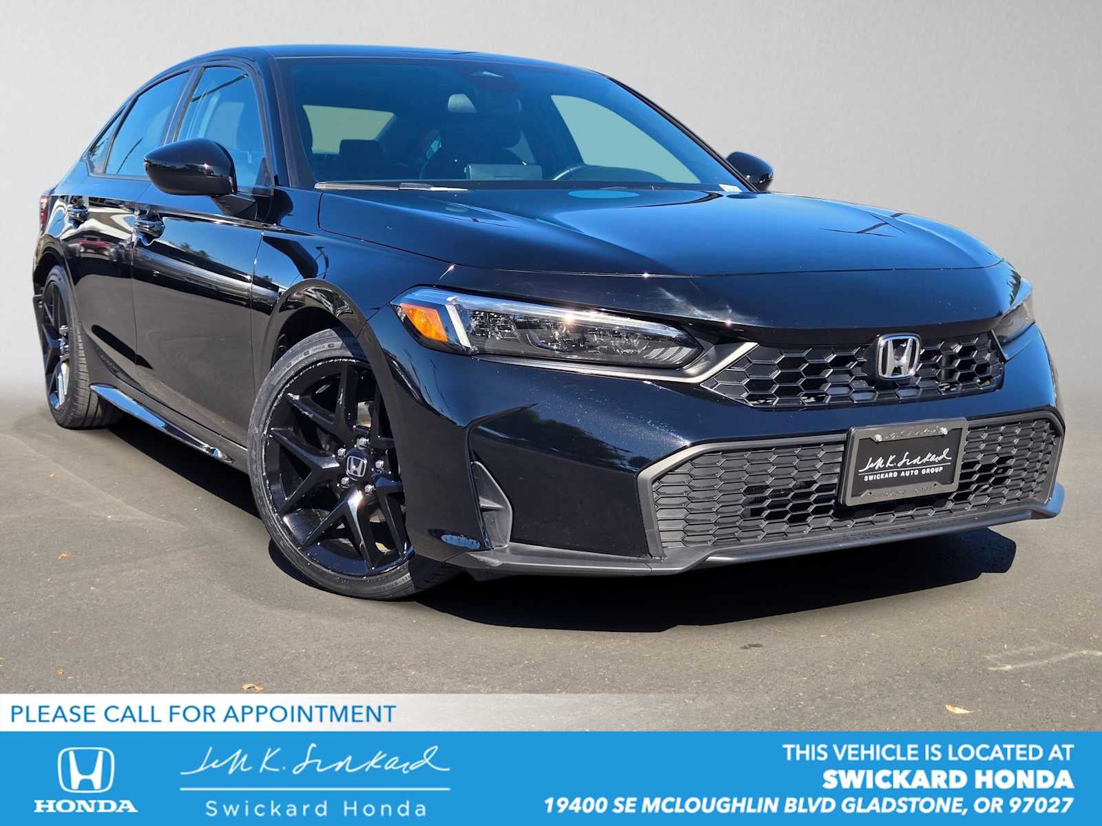 2025 Honda Civic Sport in Crystal Black Pearl — front three-quarter view