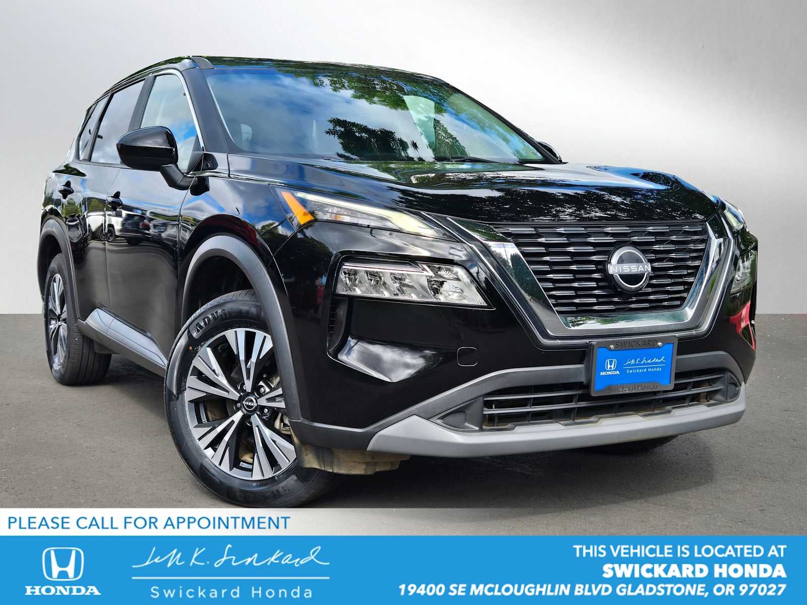 2023 Nissan Rogue SV in Super Black — front three-quarter view