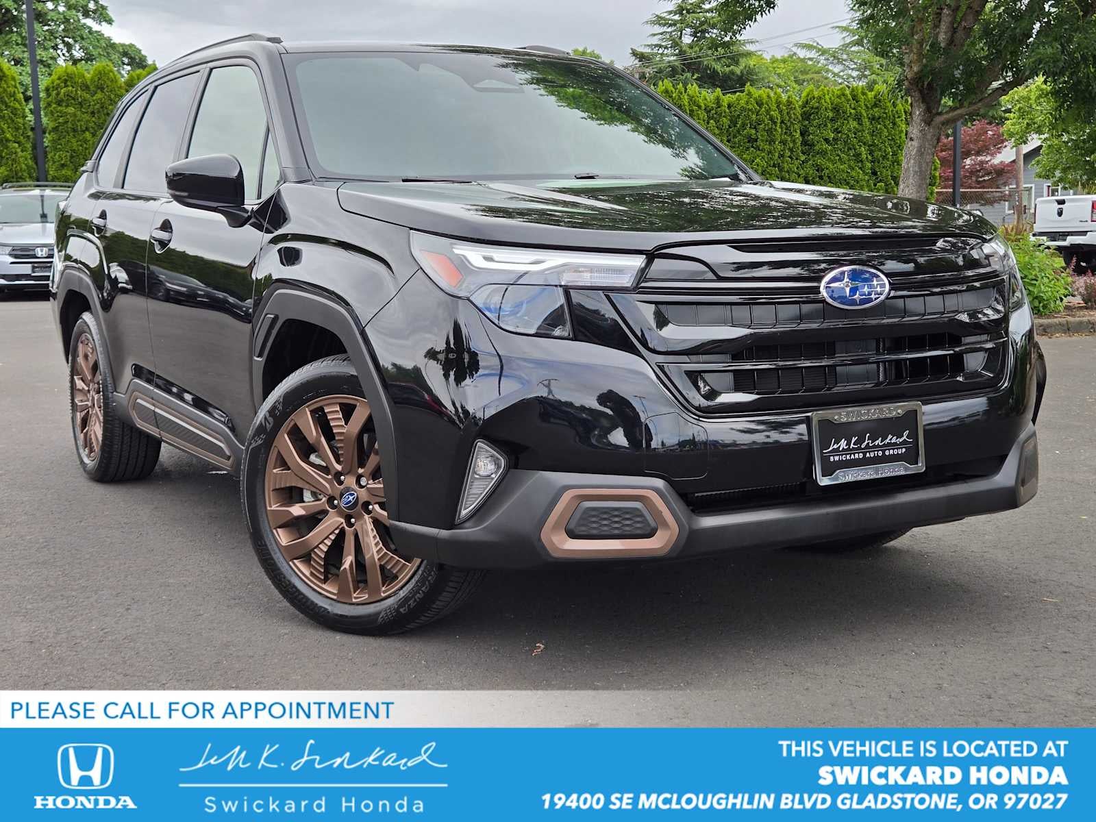 2025 Subaru Forester Sport in Crystal Black Silica — front three-quarter view