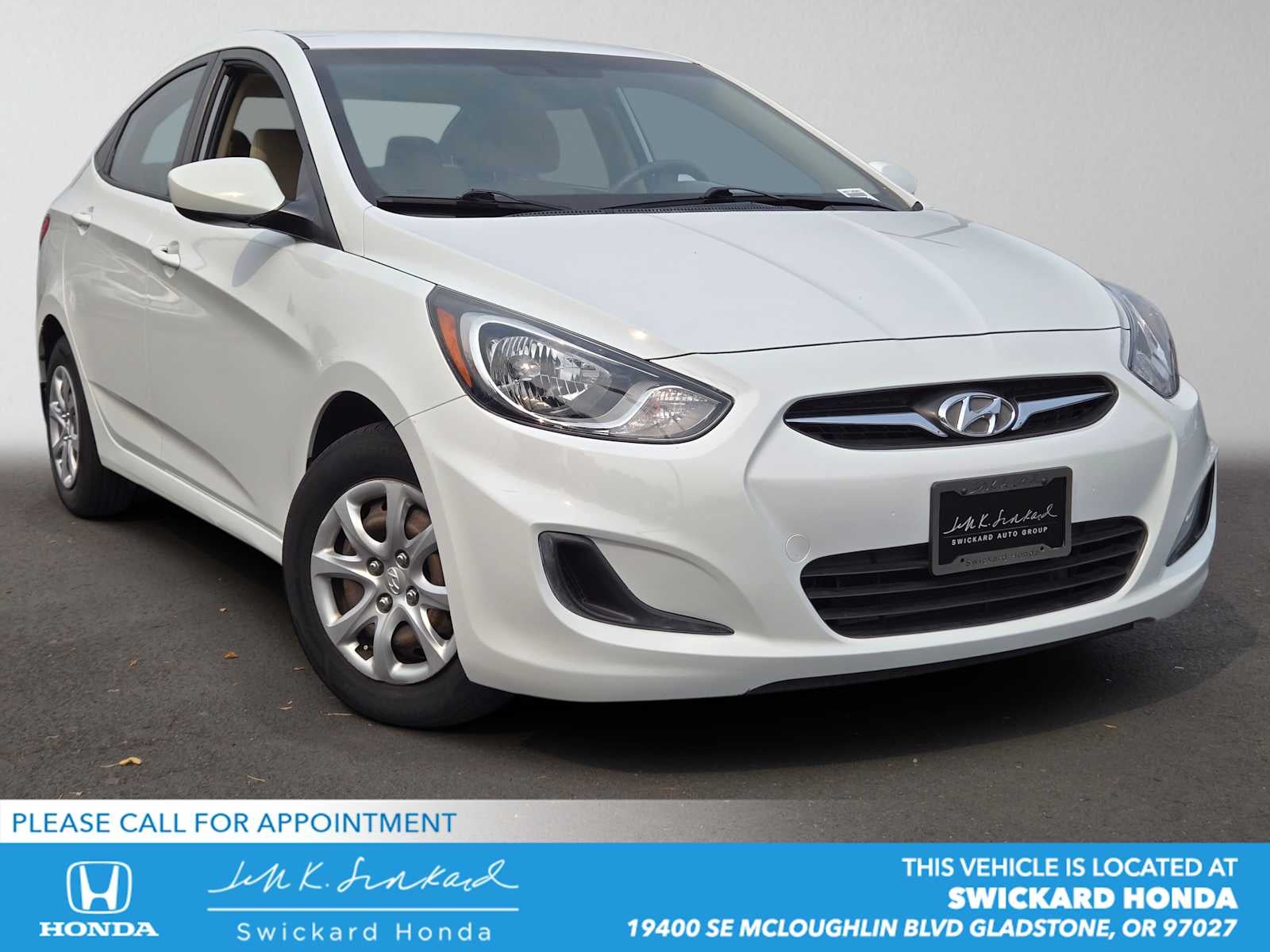 2013 Hyundai ACCENT GLS in Century White — front three-quarter view