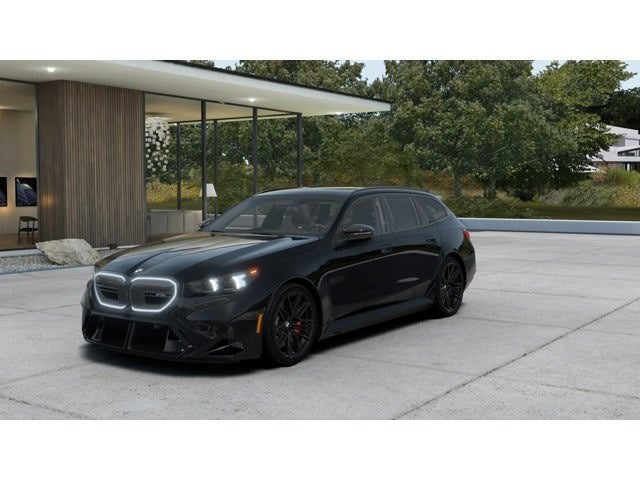 2027 BMW M5 Touring in Black Sapphire Metallic — front three-quarter view
