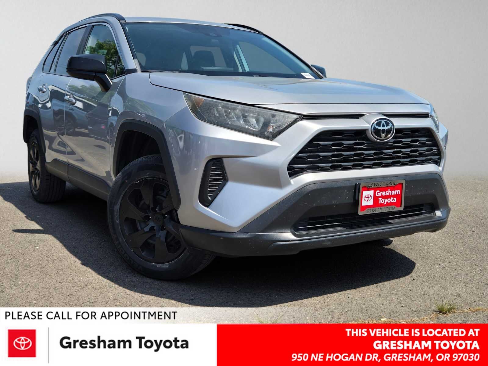 2021 Toyota RAV4 LE in Silver Sky Metallic — front three-quarter view