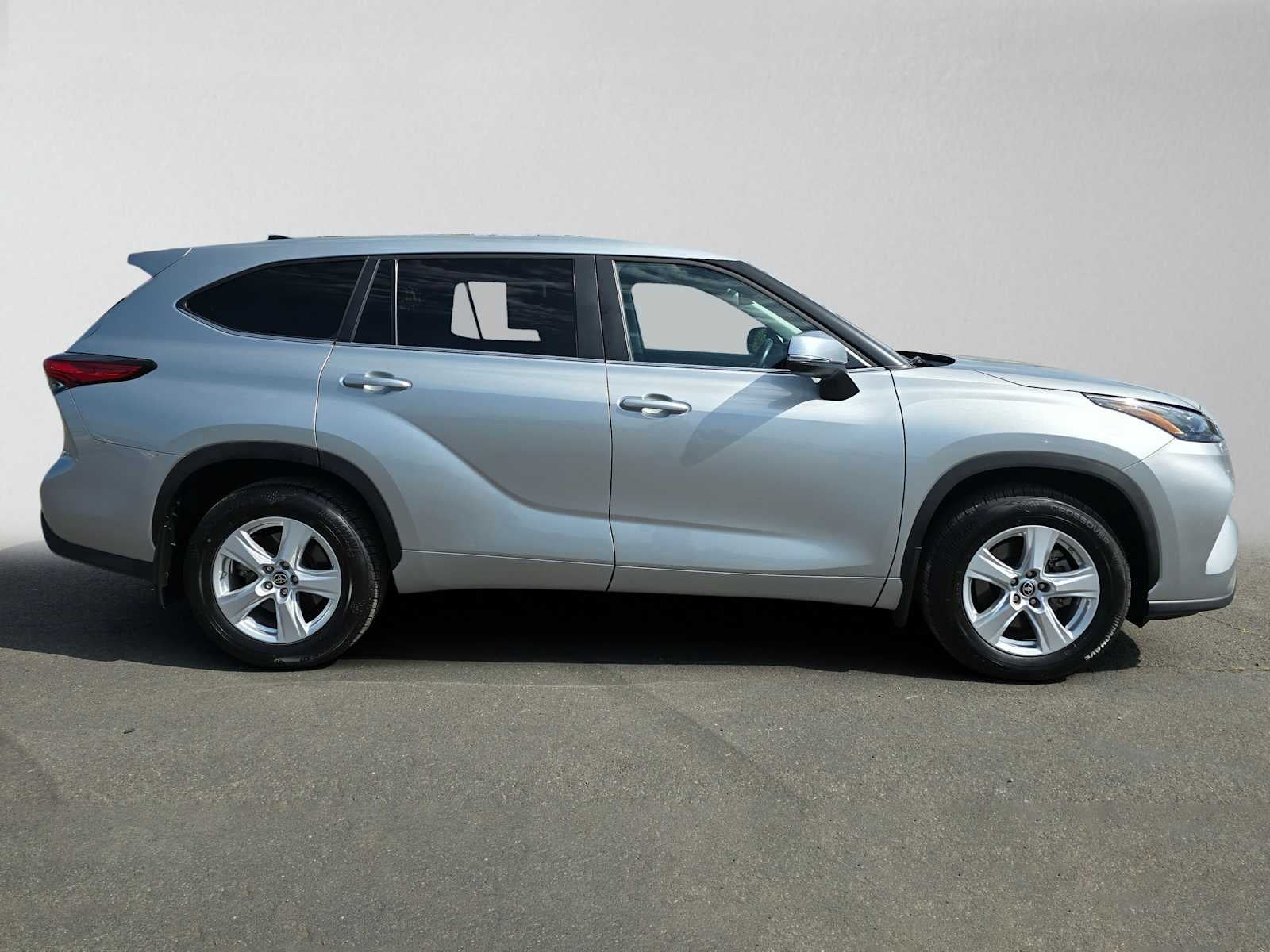 2023 Toyota Highlander — rear three-quarter view