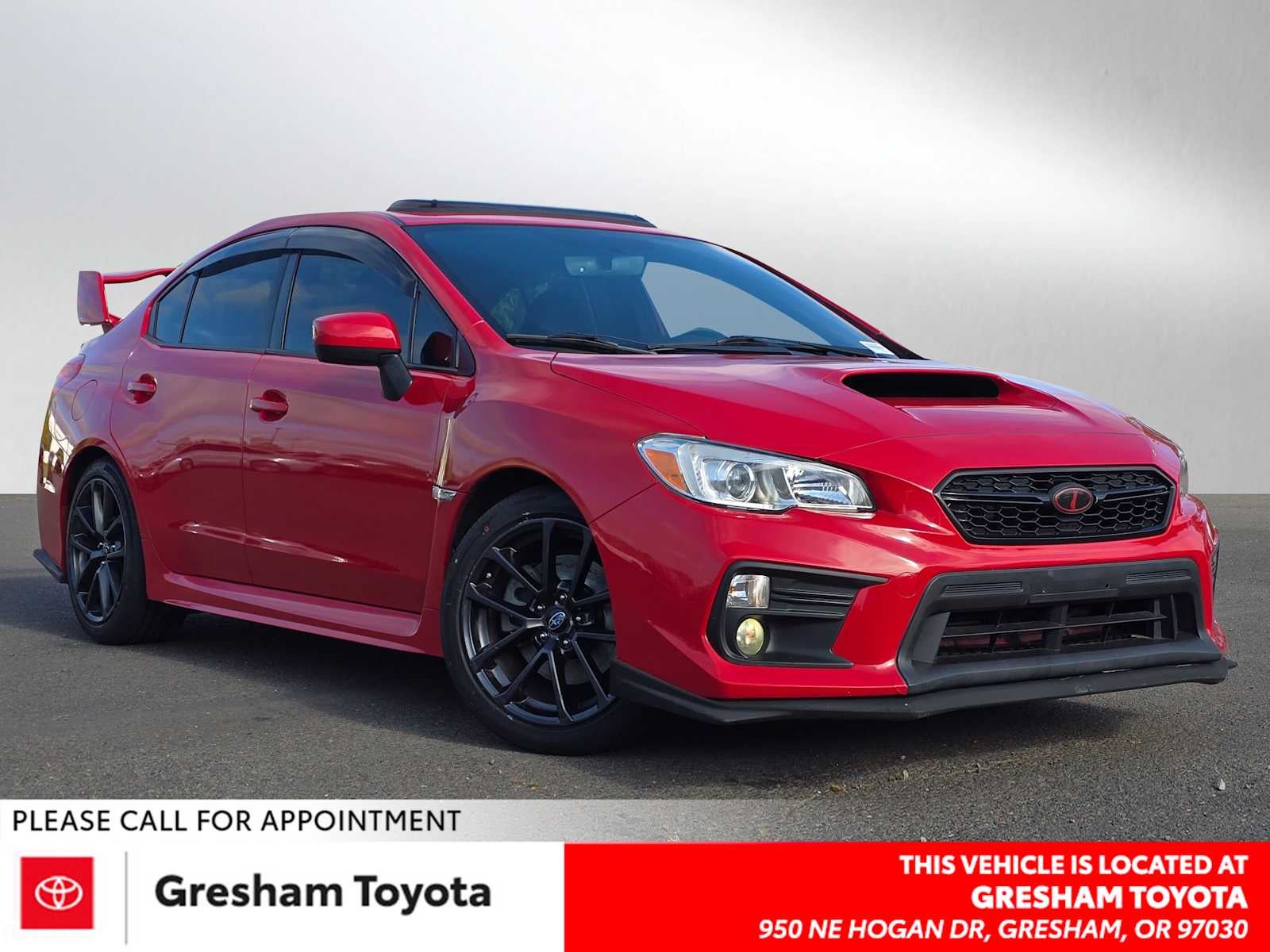 2018 Subaru WRX Premium in Pure Red — front three-quarter view