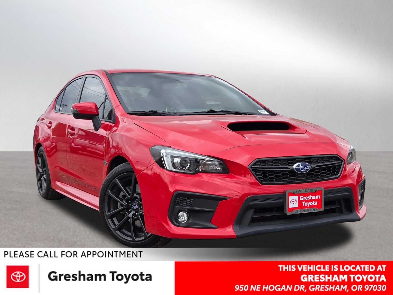 2019 Subaru WRX Limited in Pure Red — front three-quarter view