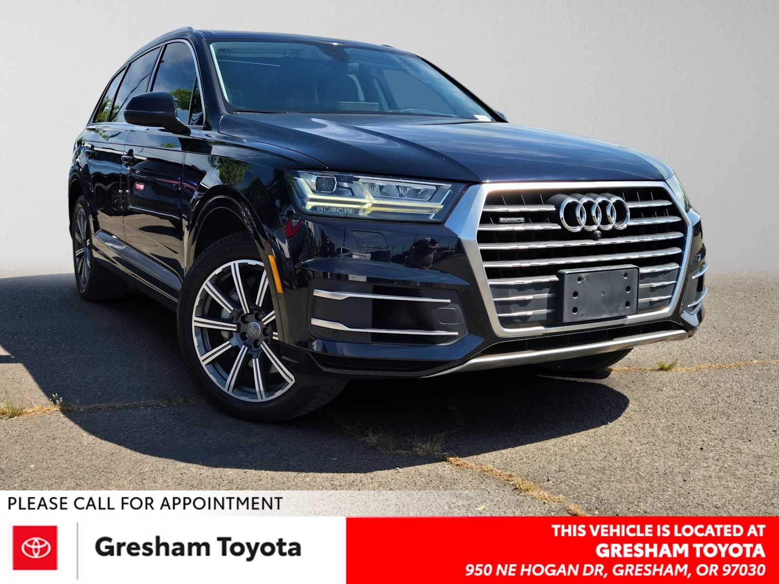 2017 Audi Q7 Premium Plus in Ink Blue Metallic — front three-quarter view